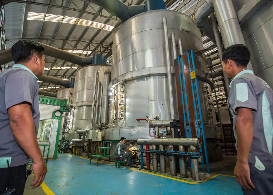 Kanthararom refining facility — evaporator hall with real-time monitoring